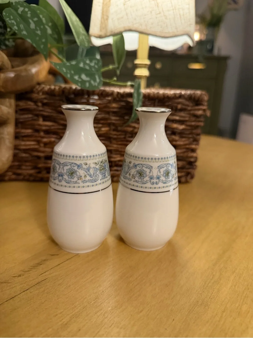 Elegant White Ceramic Salt and Pepper Shakers with Blue Floral Accent